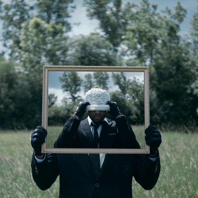 WHO AM I? cover art